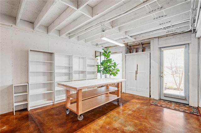 dining room with concrete floors