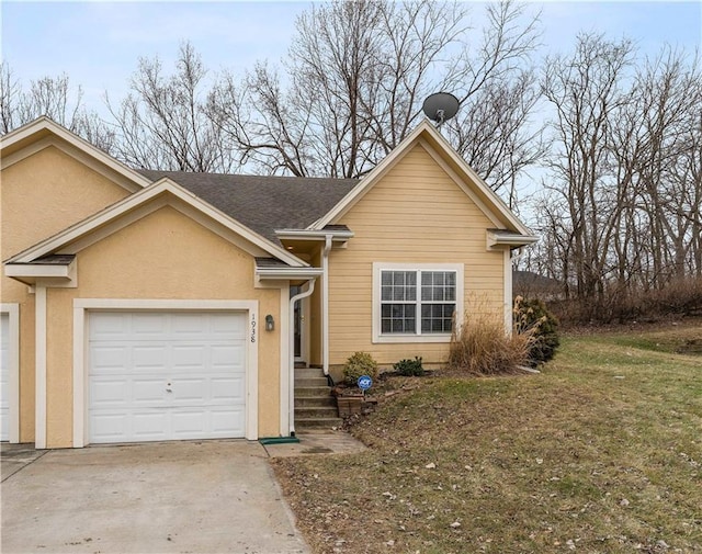 view of front of house with a garage, concrete driveway, and stucco siding