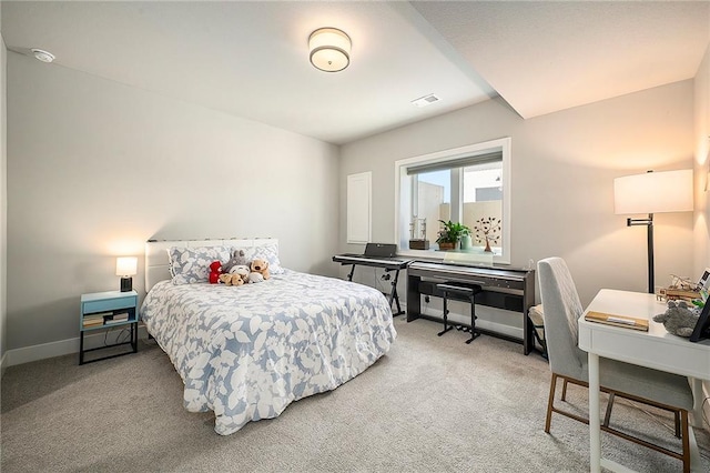 bedroom featuring visible vents, light colored carpet, and baseboards