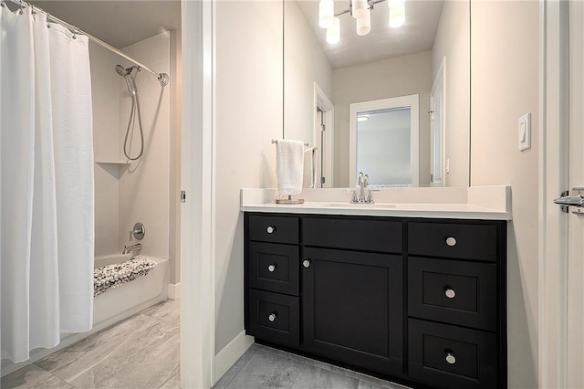 full bathroom featuring shower / tub combo with curtain and vanity