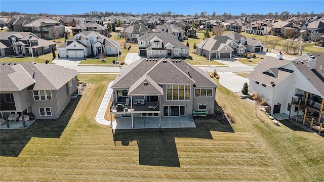 drone / aerial view with a residential view