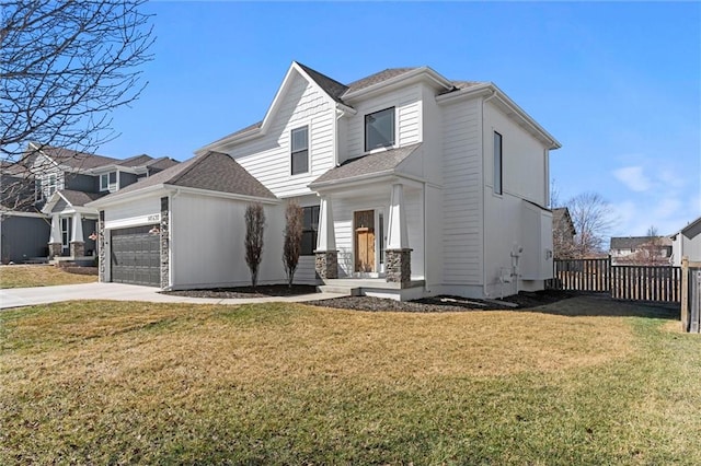 view of front facade featuring an attached garage, a front lawn, fence, and driveway