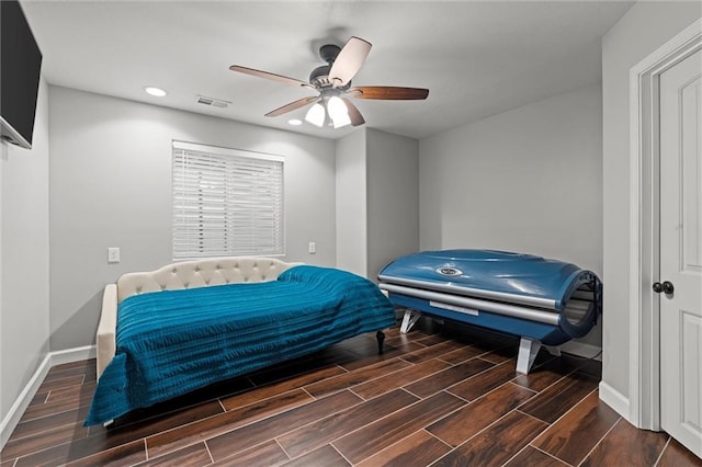 bedroom with visible vents, wood tiled floor, baseboards, and recessed lighting