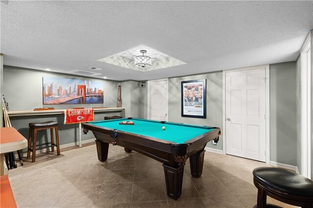 132 The Woodlands Dr, Gladstone, MO 64119 - rec room featuring baseboards, a textured ceiling, and pool table
