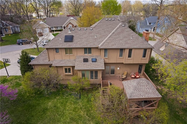 132 The Woodlands Dr, Gladstone, MO 64119 - bird's eye view with a residential view