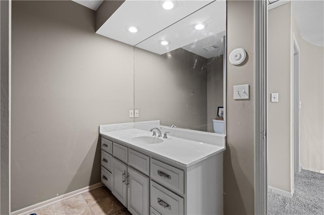 132 The Woodlands Dr, Gladstone, MO 64119 - bathroom with baseboards and vanity
