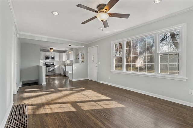 unfurnished living room with dark wood-type flooring, ceiling fan, and ornamental molding