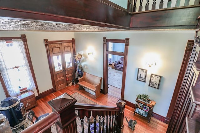 entryway featuring a wealth of natural light and wood finished floors