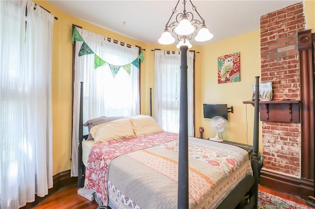 bedroom with wood finished floors