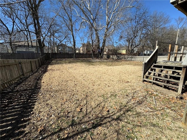 view of yard featuring a fenced backyard