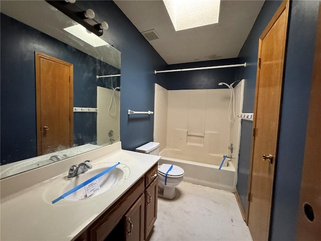 bathroom with toilet, vanity, visible vents, and bathing tub / shower combination