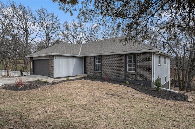 ranch-style house with a garage, brick siding, driveway, and fence