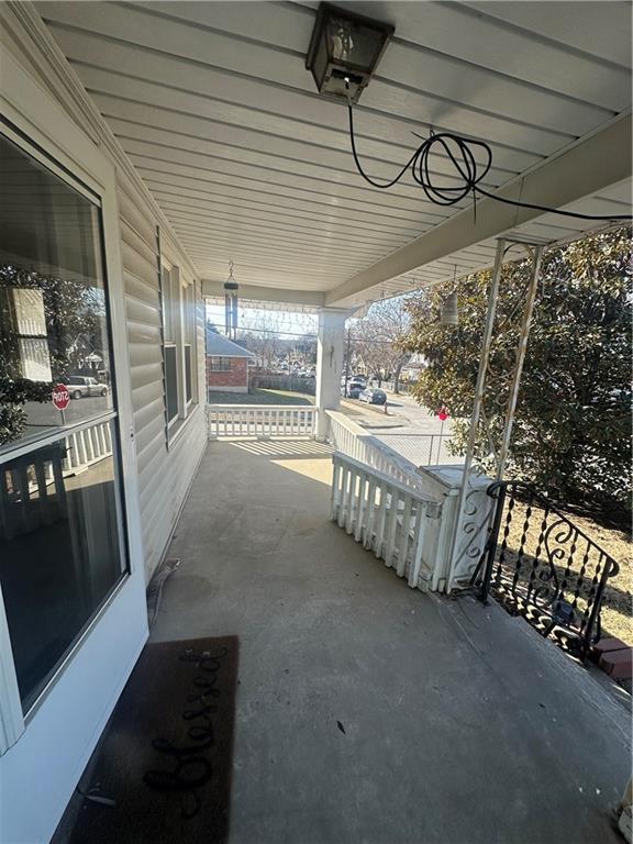 view of patio featuring a porch