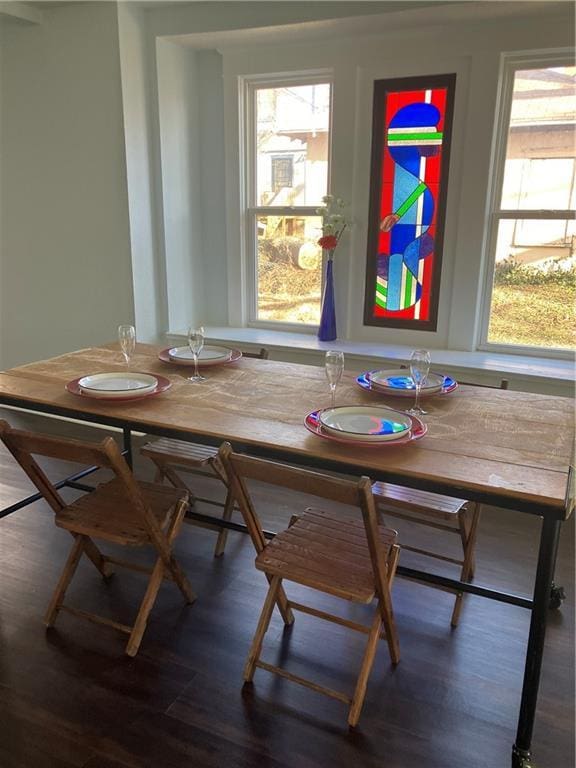 unfurnished dining area with wood finished floors