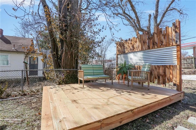 wooden deck featuring fence