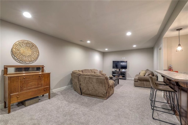 living area with baseboards, carpet flooring, and recessed lighting