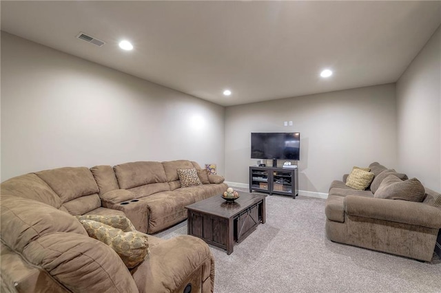 living area featuring light carpet, baseboards, visible vents, and recessed lighting