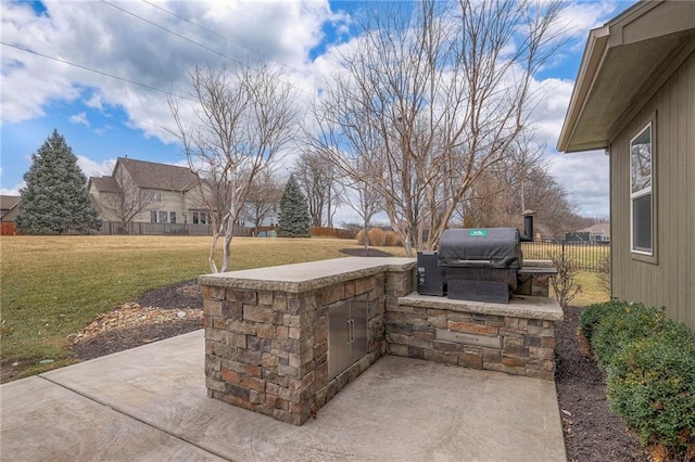 view of patio / terrace featuring grilling area, area for grilling, and fence