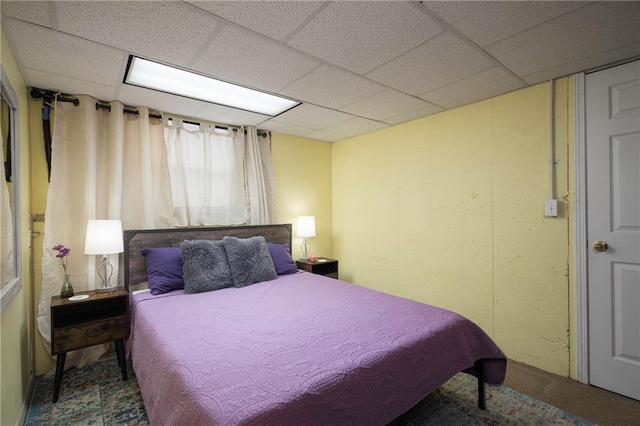 bedroom with a drop ceiling