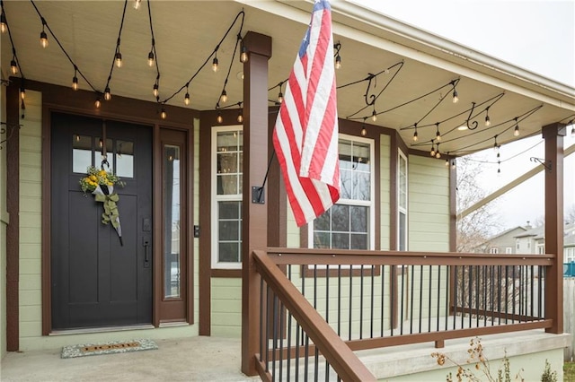 doorway to property featuring covered porch