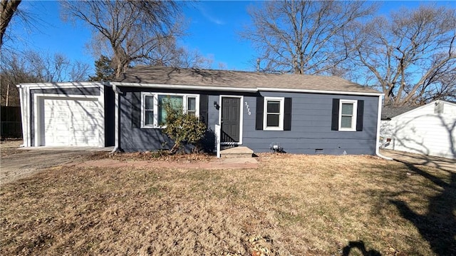 ranch-style home with driveway, a garage, roof with shingles, crawl space, and a front lawn