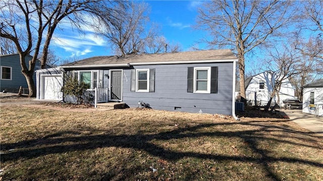 view of front of home with a shingled roof, crawl space, central AC, a garage, and a front lawn