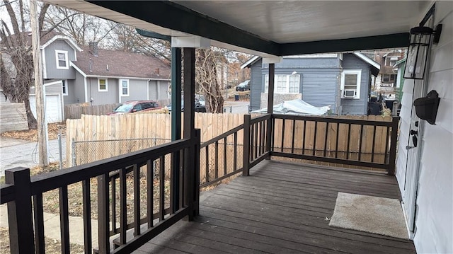 wooden deck featuring fence