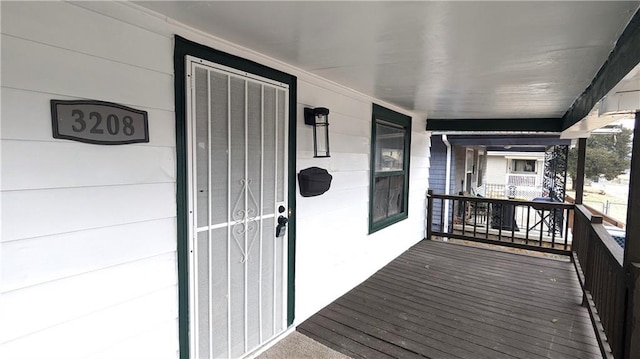 deck featuring covered porch