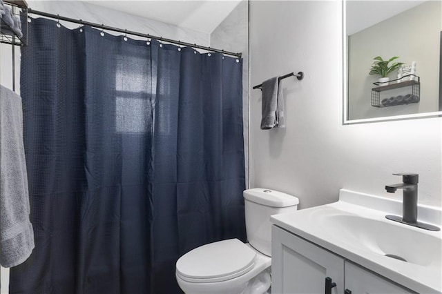 full bathroom with toilet, vanity, and a shower with curtain