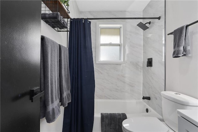 bathroom with toilet and shower / bath combo