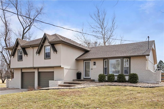 tri-level home featuring an attached garage, brick siding, driveway, and a front lawn