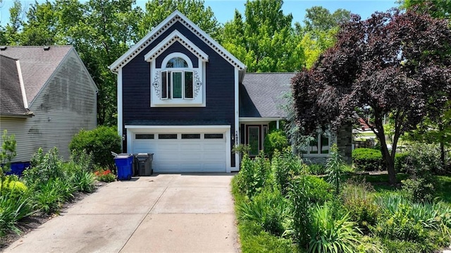 14953 W 124th Ter, Olathe, KS 66062 - view of front of house with an attached garage and concrete driveway