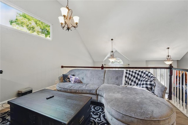 14953 W 124th Ter, Olathe, KS 66062 - living room with lofted ceiling, a chandelier, and wood finished floors