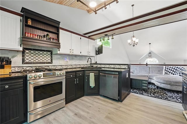 14953 W 124th Ter, Olathe, KS 66062 - kitchen with stainless steel appliances, a sink, white cabinets, a chandelier, and light wood-type flooring