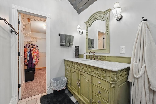 14953 W 124th Ter, Olathe, KS 66062 - bathroom with vanity, a spacious closet, lofted ceiling, and wood ceiling