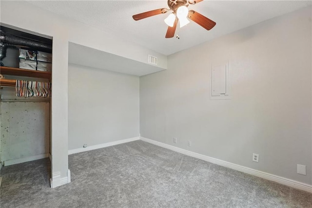 14953 W 124th Ter, Olathe, KS 66062 - unfurnished bedroom with carpet flooring, baseboards, a closet, and a ceiling fan