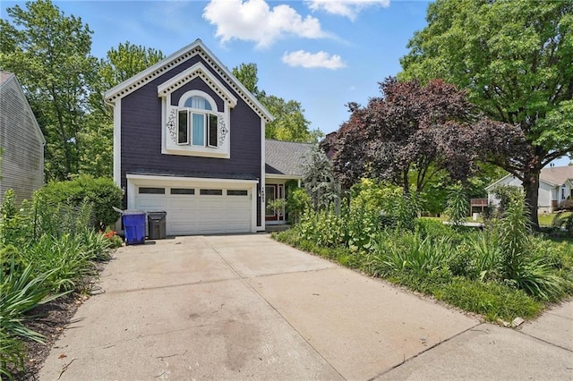14953 W 124th Ter, Olathe, KS 66062 - view of front of house with an attached garage and driveway
