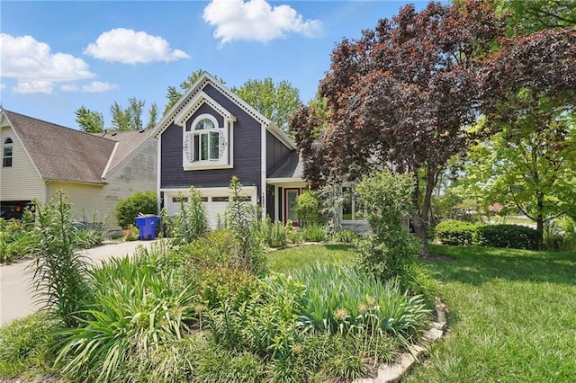 14953 W 124th Ter, Olathe, KS 66062 - view of front of home featuring a garage, concrete driveway, and a front lawn