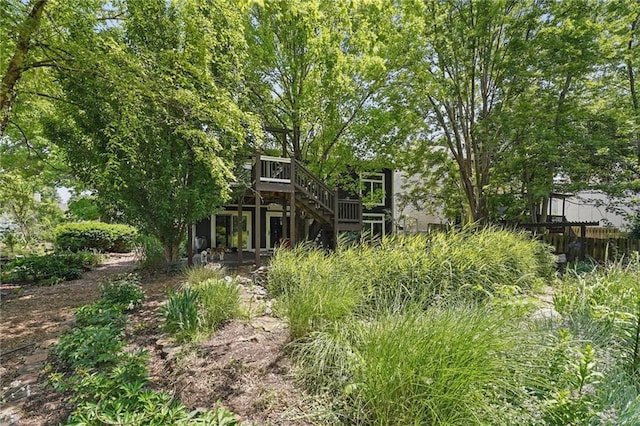 14953 W 124th Ter, Olathe, KS 66062 - view of yard with a wooden deck and stairs