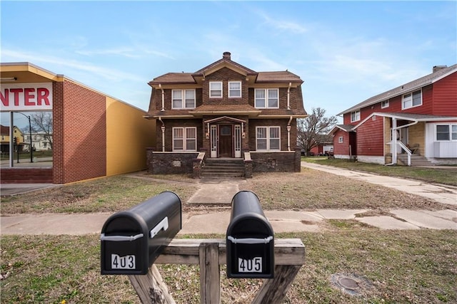 view of front of property featuring brick siding