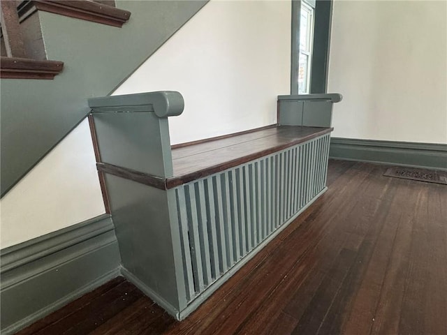 details with baseboards and wood finished floors