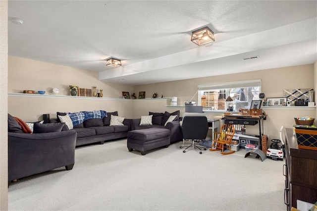 carpeted living area featuring visible vents and a textured ceiling