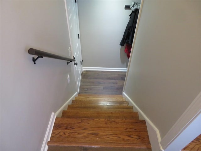 24243 Sandusky Rd, Tonganoxie, KS 66086 - stairway featuring wood finished floors and baseboards