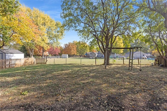 view of yard featuring fence