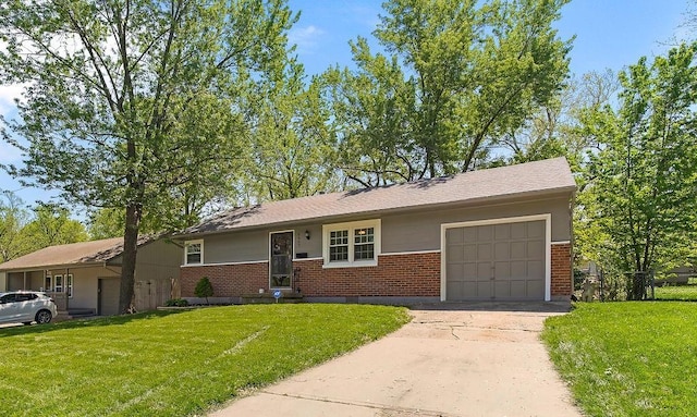 ranch-style house featuring an attached garage, concrete driveway, a front lawn, and brick siding