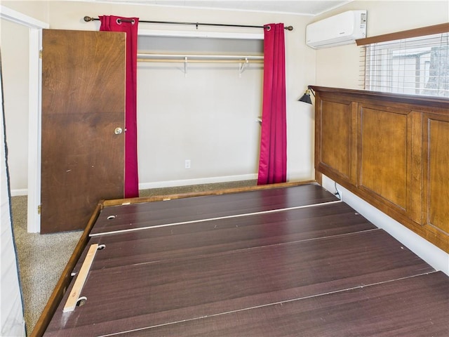 interior space with a wall mounted air conditioner