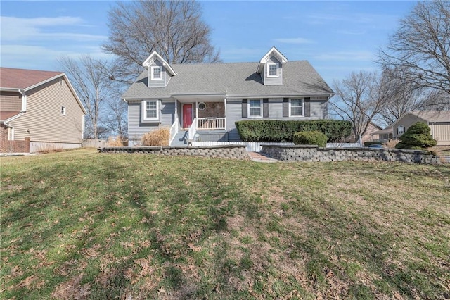 new england style home featuring a front lawn