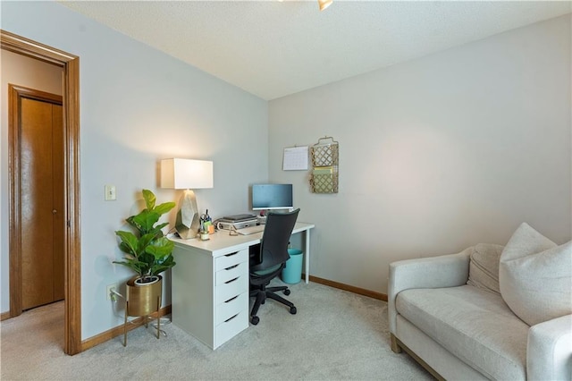 office area with baseboards and light colored carpet