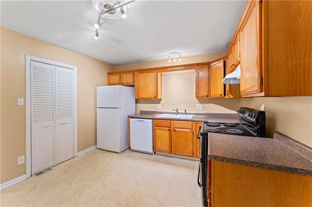 6418 E 150th St, Grandview, MO 64030 - kitchen featuring white appliances, a sink, under cabinet range hood, dark countertops, and a textured ceiling