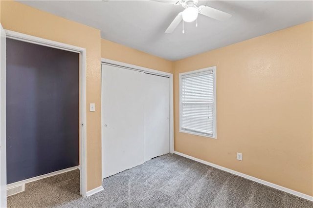 6418 E 150th St, Grandview, MO 64030 - unfurnished bedroom with carpet, a closet, baseboards, and ceiling fan